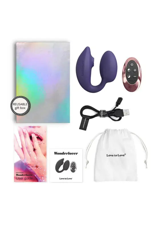 Double stimulateur féminin Wonderlover violet avec boîte cadeau, câble USB et livret d'utilisation de Love to Love.