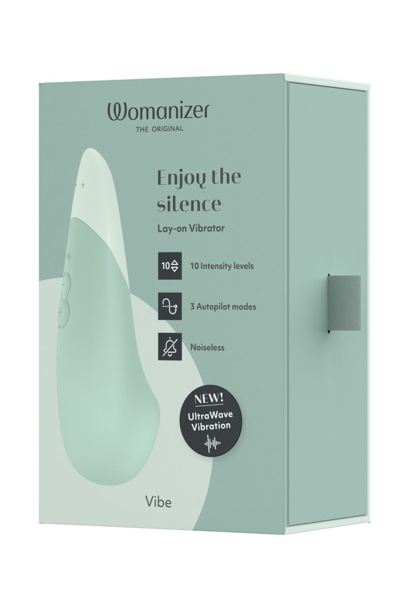 Womanizer Vibe sauge silencieux et efficace dans sa boite de la même couleur