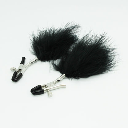 Pinces à seins avec plumes noires · Dreamy Fetish