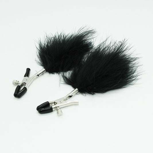 Pinces à seins avec plumes noires · Dreamy Fetish