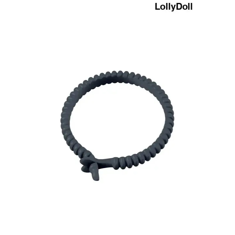 Cockring Dorcel Adjust Ring noir pour une stimulation intense. Idéal pour accompagner un gode disponible chez LollyDoll