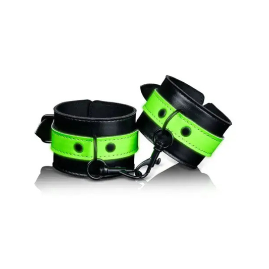 Menottes phosphorescentes de poignets Ouch! en noir et vert pour des jeux coquins lumineux.