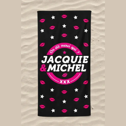 Serviette humoristique de plage Jacquie et Michel noire, avec Logo rond et rose : on dit merci qui? avec des bisous roses et étoiles blanches