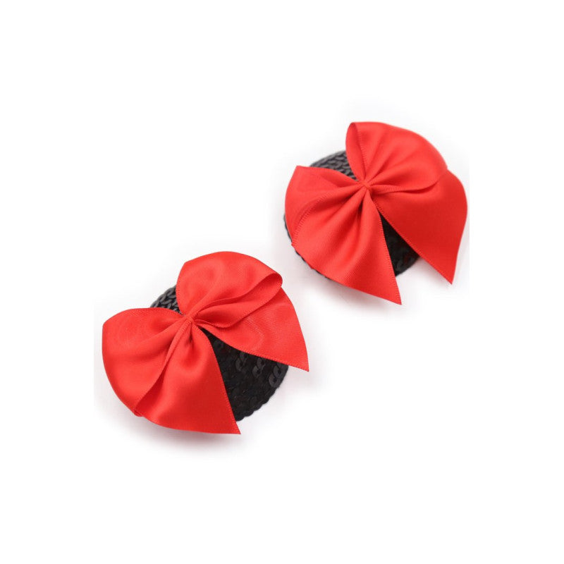 Cache tétons nœud papillon noir rouge satin — vue de face, paire complète sur fond neutre