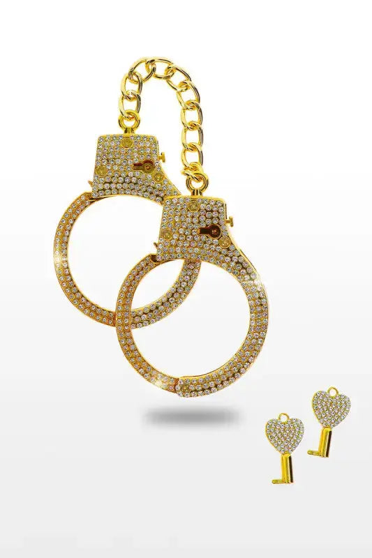 Menottes dorées et strass diamants avec clés en forme de cœur dorée et strass également