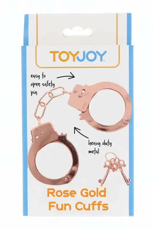 Menottes métal rose gold TOYJOY avec pin de sécurité facile à ouvrir et métal robuste, idéal pour des jeux de rôles.