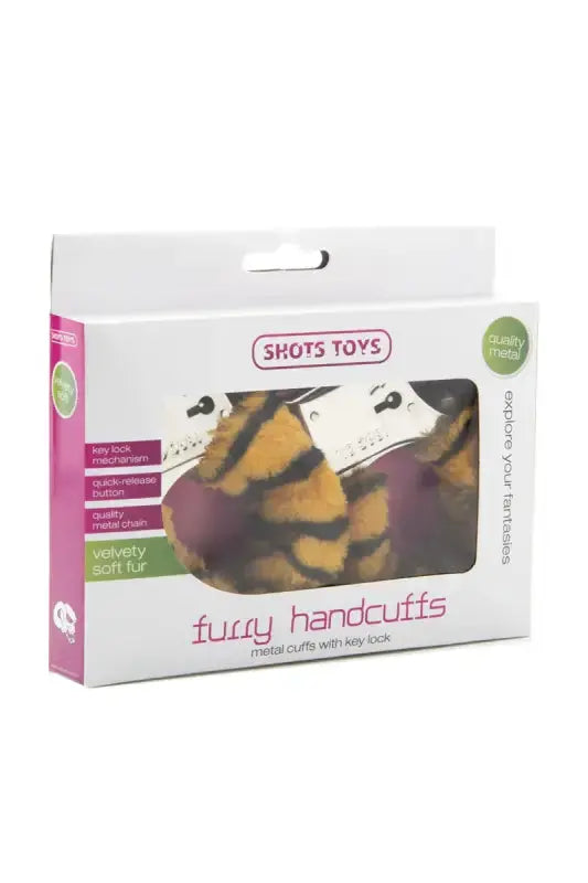 Emballage des menottes fourrure tigre de Shots Toys, conçu pour le confort et le jeu.