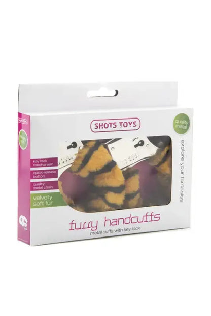 Emballage des menottes fourrure tigre de Shots Toys, conçu pour le confort et le jeu.