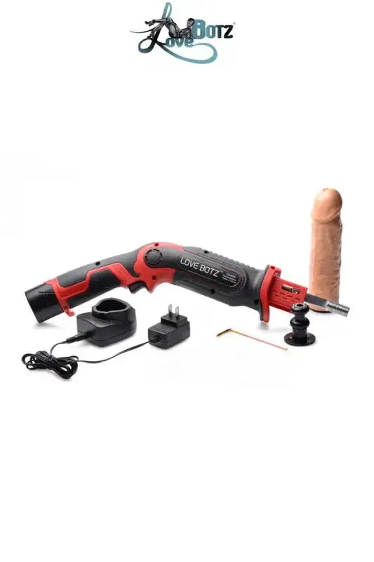 Sex Machine alternative rouge et noire avec accessoires et godemiché.