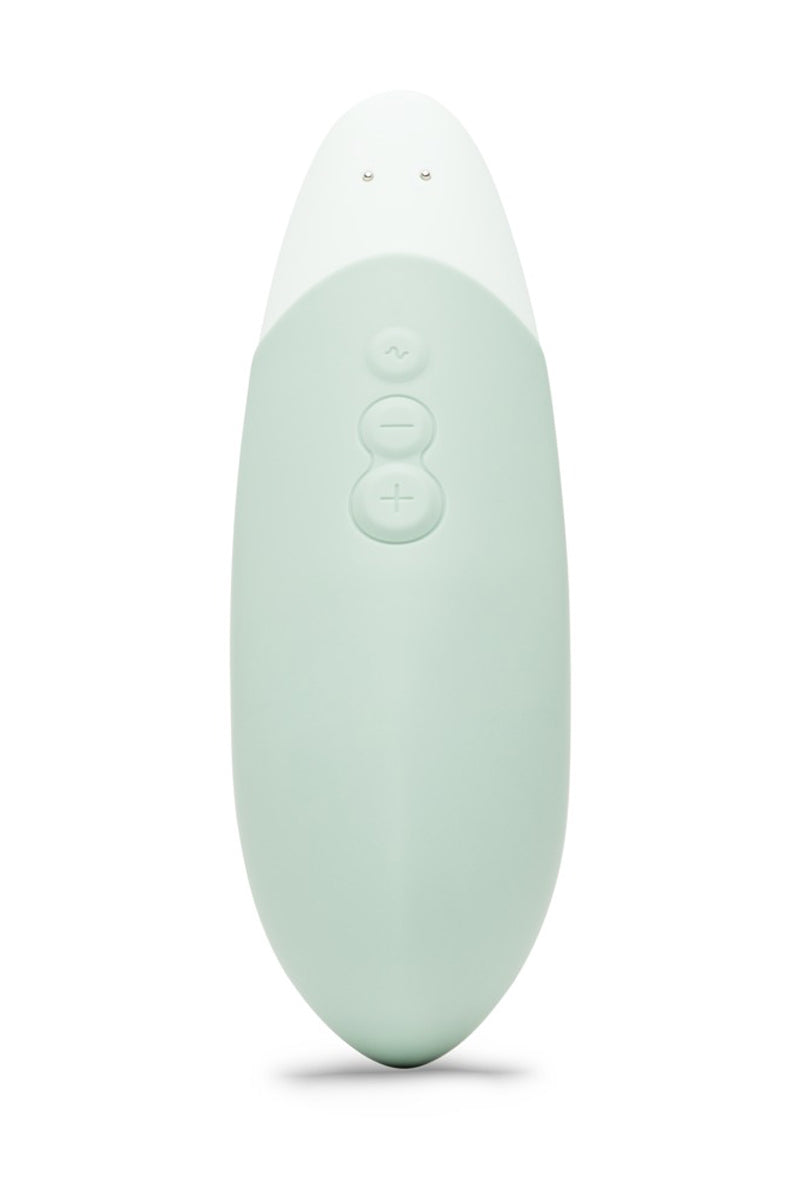Vue détaillée du Womanizer Vibe sauge – surface silicone hypoallergénique et design ergonomique lay on