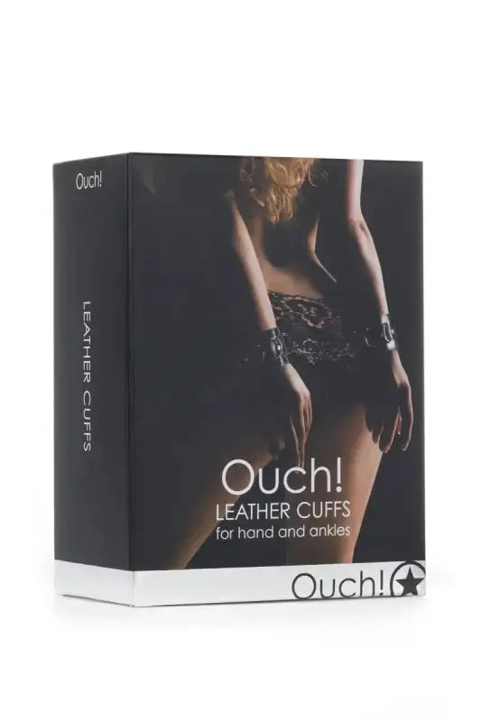 Menottes cuir Ouch! présentées dans une boîte élégante pour mains et chevilles, parfaites pour des jeux BDSM.