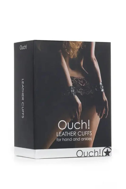 Menottes cuir Ouch! présentées dans une boîte élégante pour mains et chevilles, parfaites pour des jeux BDSM.