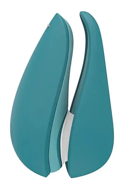 Stimulateur clitoridien Womanizer Liberty 2 bleu pétrole, design élégant et moderne pour une expérience inoubliable.