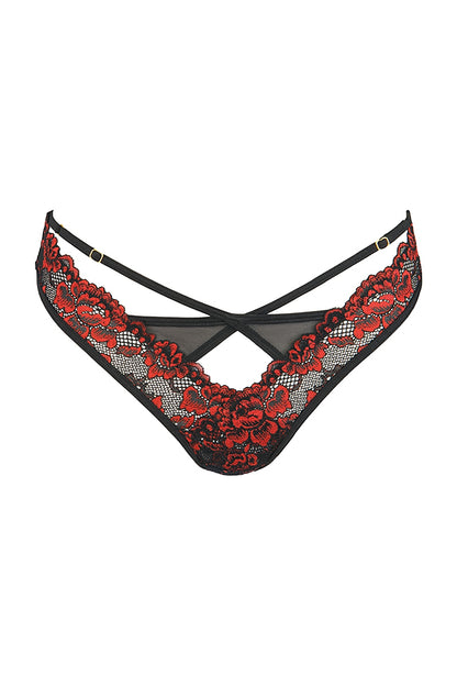 Ce string dentelle original associe une dentelle noire délicate à une broderie rouge raffinée, créant un contraste visuel intense et sophistiqué. Les motifs brodés apportent profondeur et relief, tandis que la coupe ajourée révèle subtilement la silhouette.