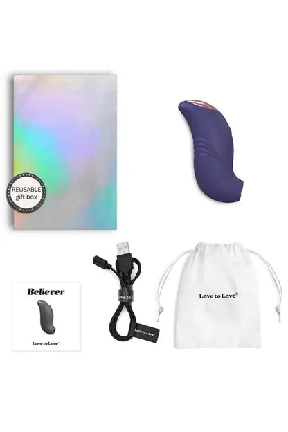 Stimulateur clitoridien Believer violet dans son coffret