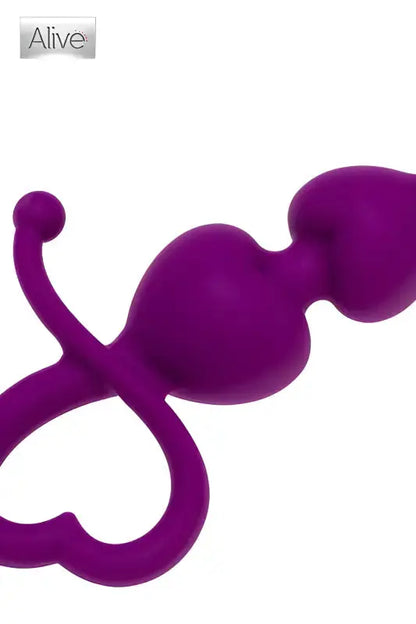 Perles anales violettes avec tirette en forme de cœur. Plug anal pour un plaisir intense