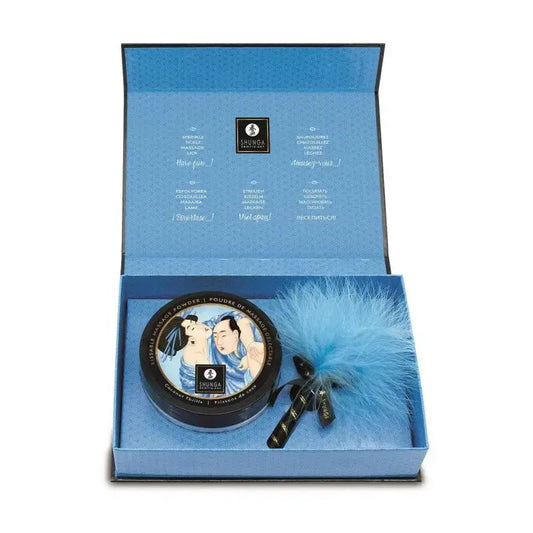 Poudre de massage délectable  et son plumeau bleu - Frissons de coco sur LollyDoll votre fournisseur de plaisir