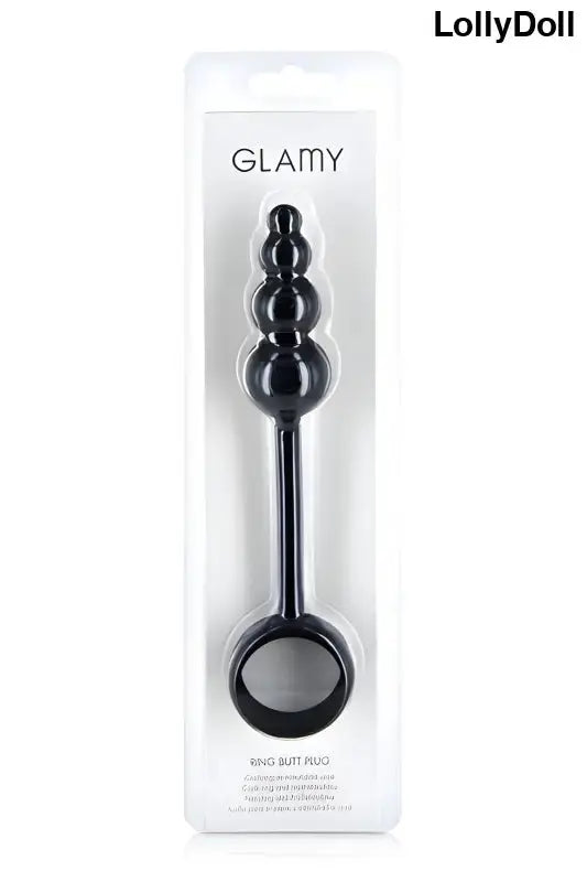 Plug anal noir combiné avec un cockring dans sa boite transparente de Glamy disponible sur LollyDoll.