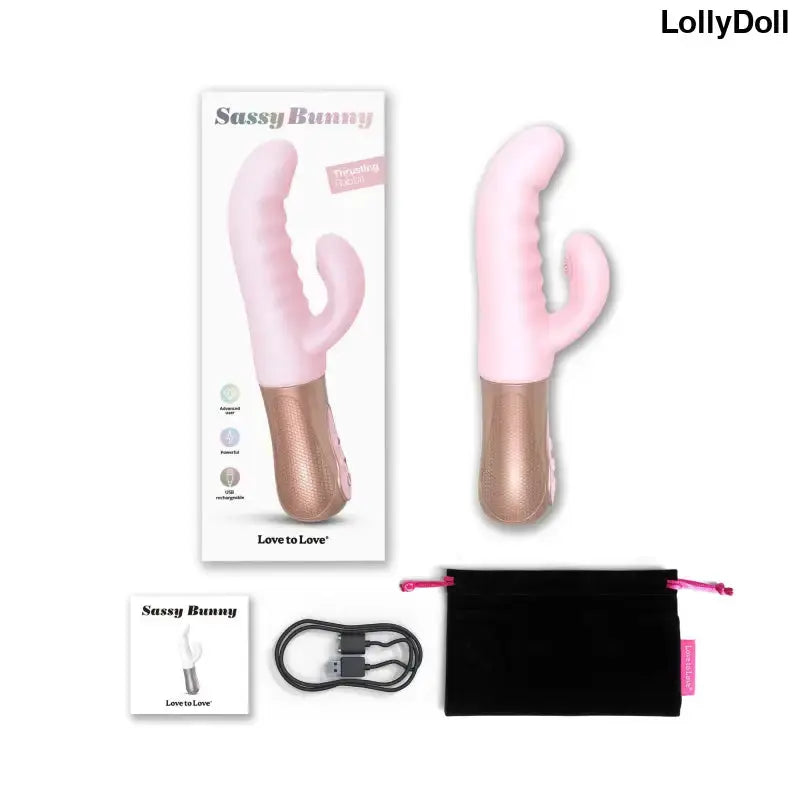 Vibromasseur Sassy Bunny en rose avec accessoires, boîte, câble et pochette, jouet innovant pour le plaisir.
