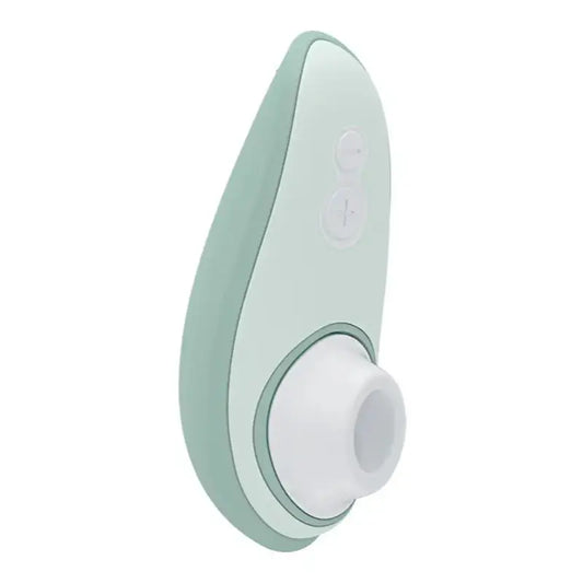 Stimulateur clitoridien Womanizer Liberty 2 en vert, appareil pour orgasmes multiples et moments d’intimité.
